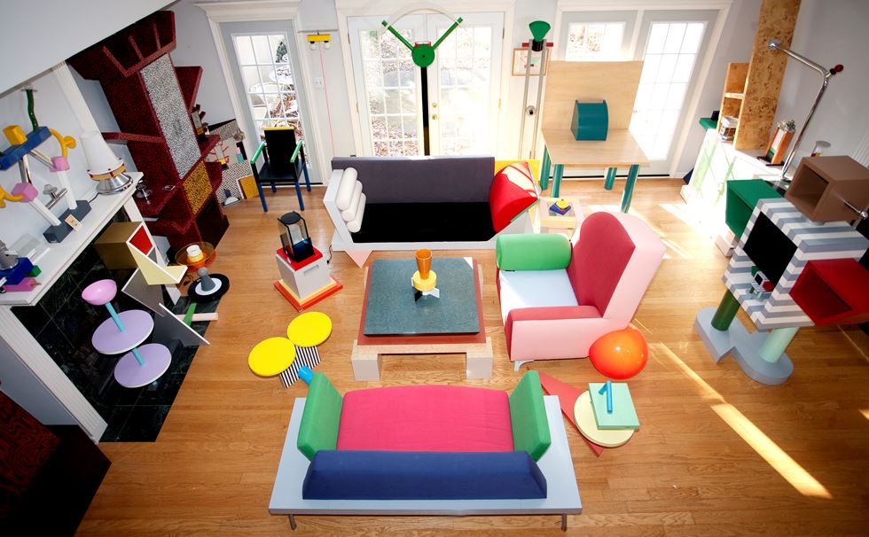 A vibrant living room filled with a variety of colorful furniture pieces.