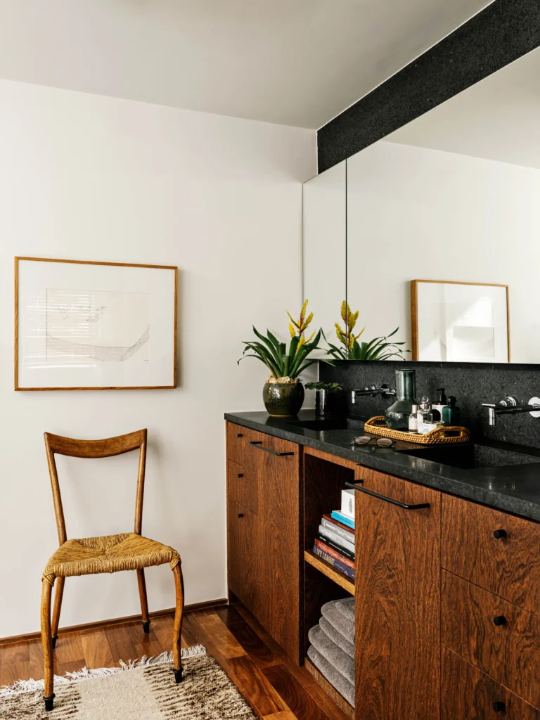 Modernist Apartment bathroom with a wood chair and a wooden cabinet