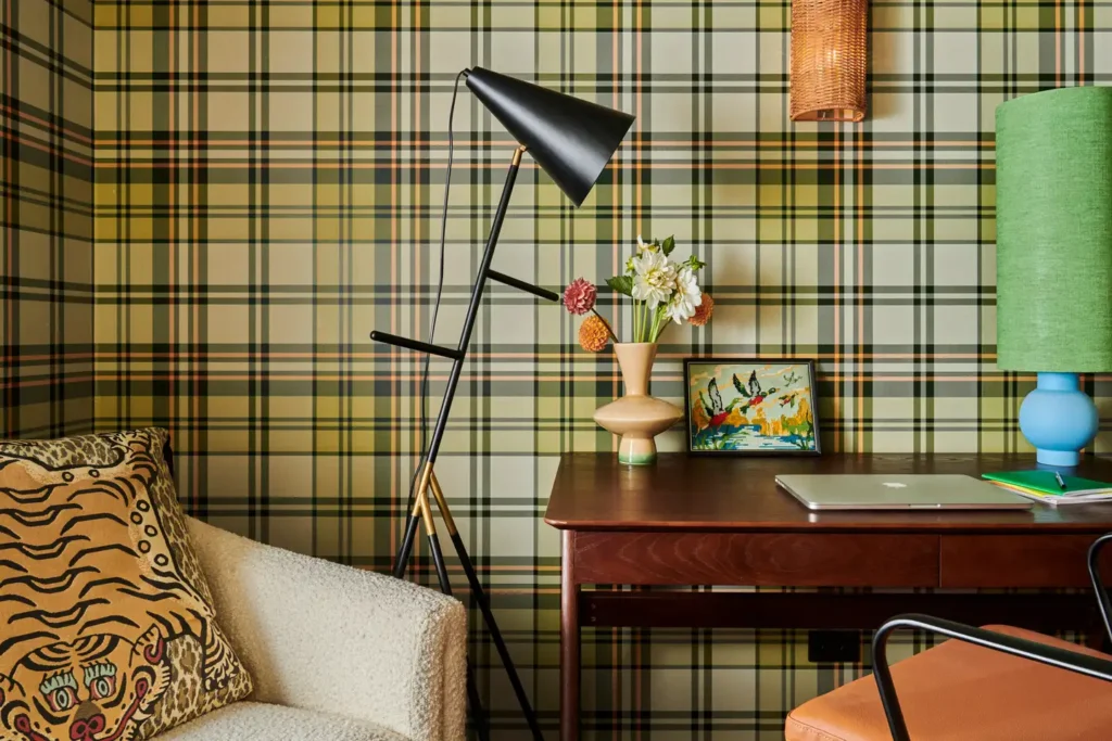 maximalist interior design study with gingham pattern wallpaper