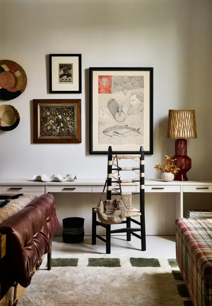 Organic Modernism style bedroom with cream walls and a white wood desk and with a leather sofa and with a textured rug and with a wooden lamp