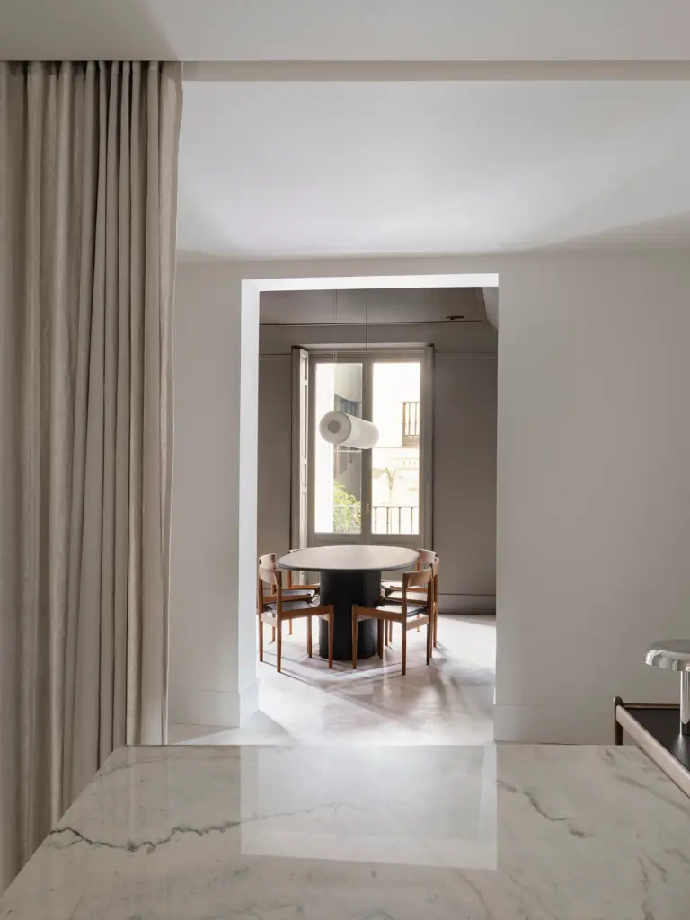 minimalist interior design dining room viewed from the kitchen